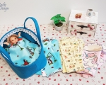 Dolls carry cot, turquoise